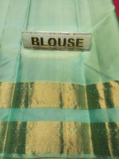 Pure Kanchipuram Silk Saree.