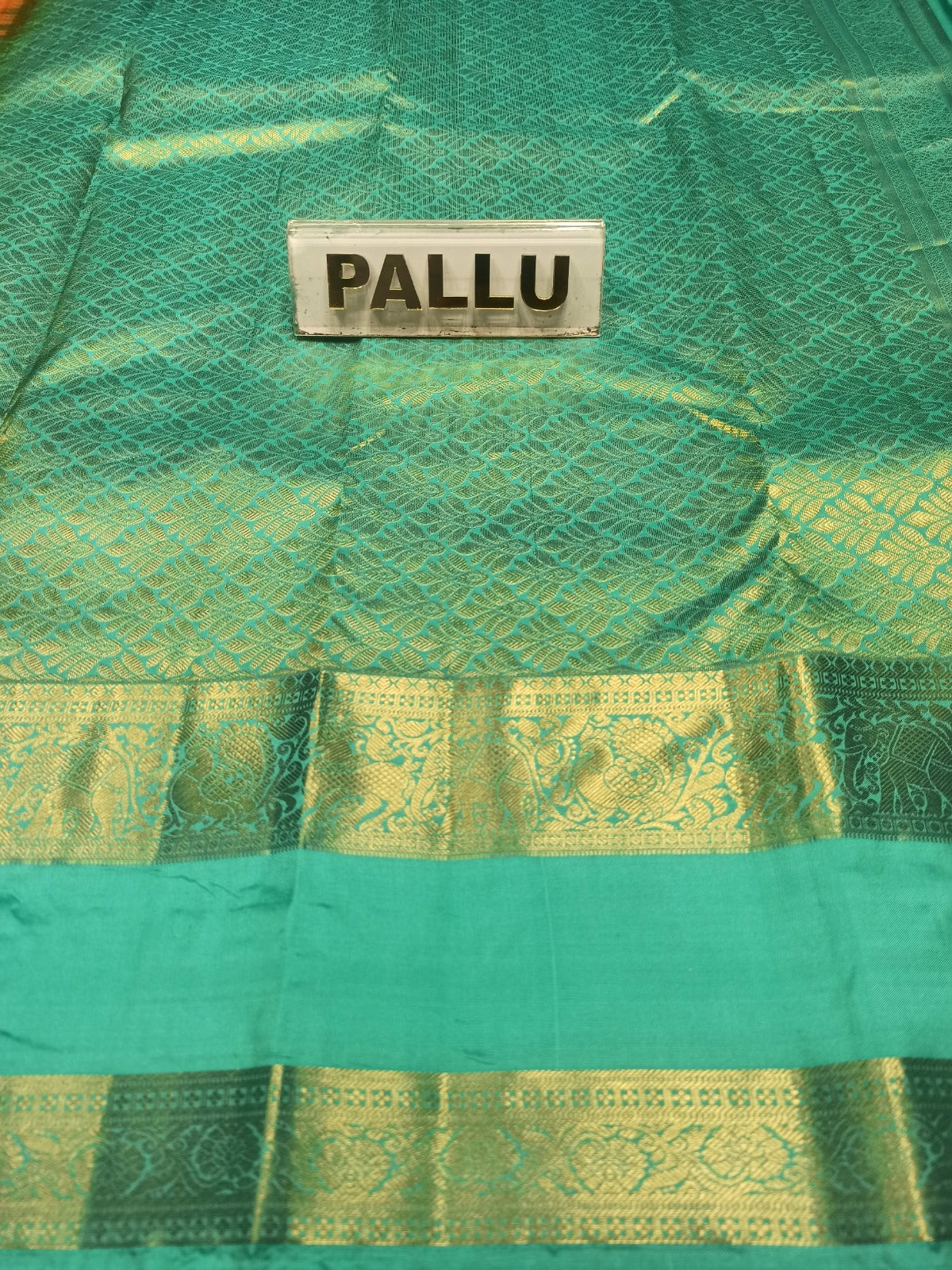 Pure Kanchipuram Silk Saree.