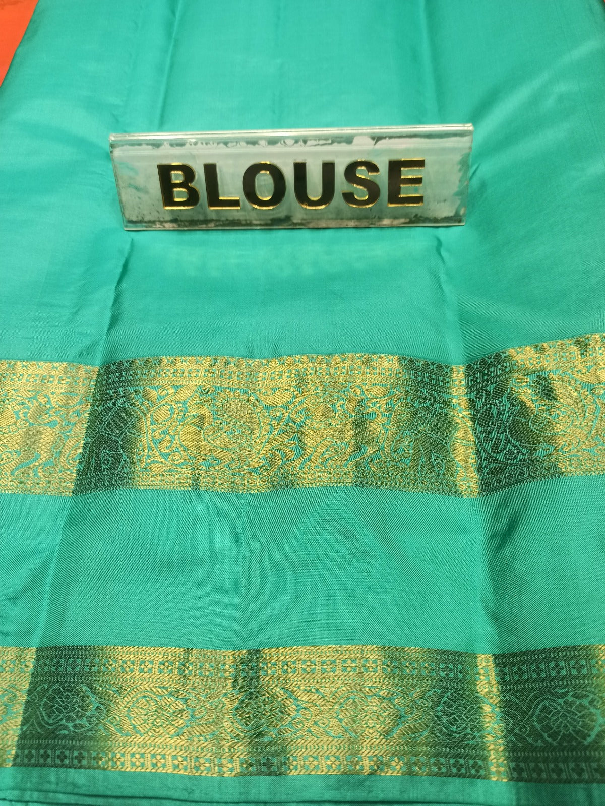 Pure Kanchipuram Silk Saree.