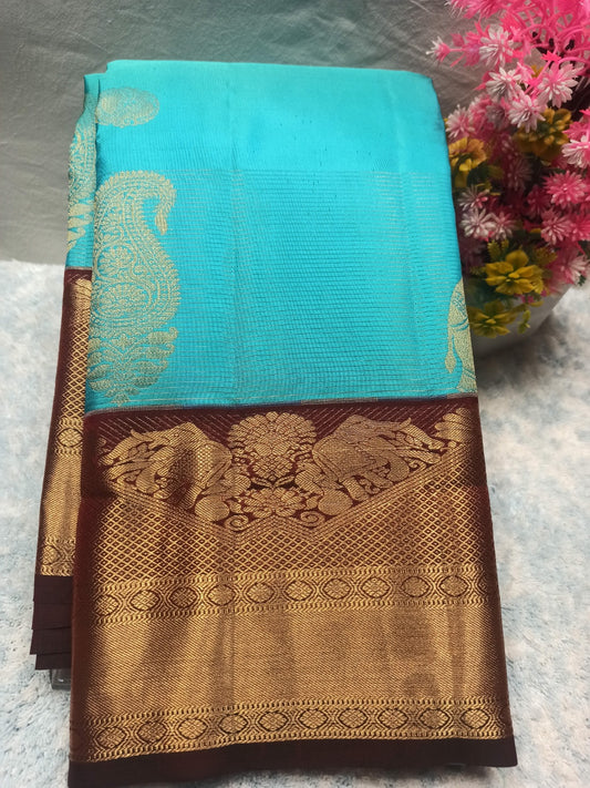 Pure Kanchipuram Silk Saree.