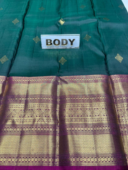 Green and purple traditional fabric with 'BODY' label