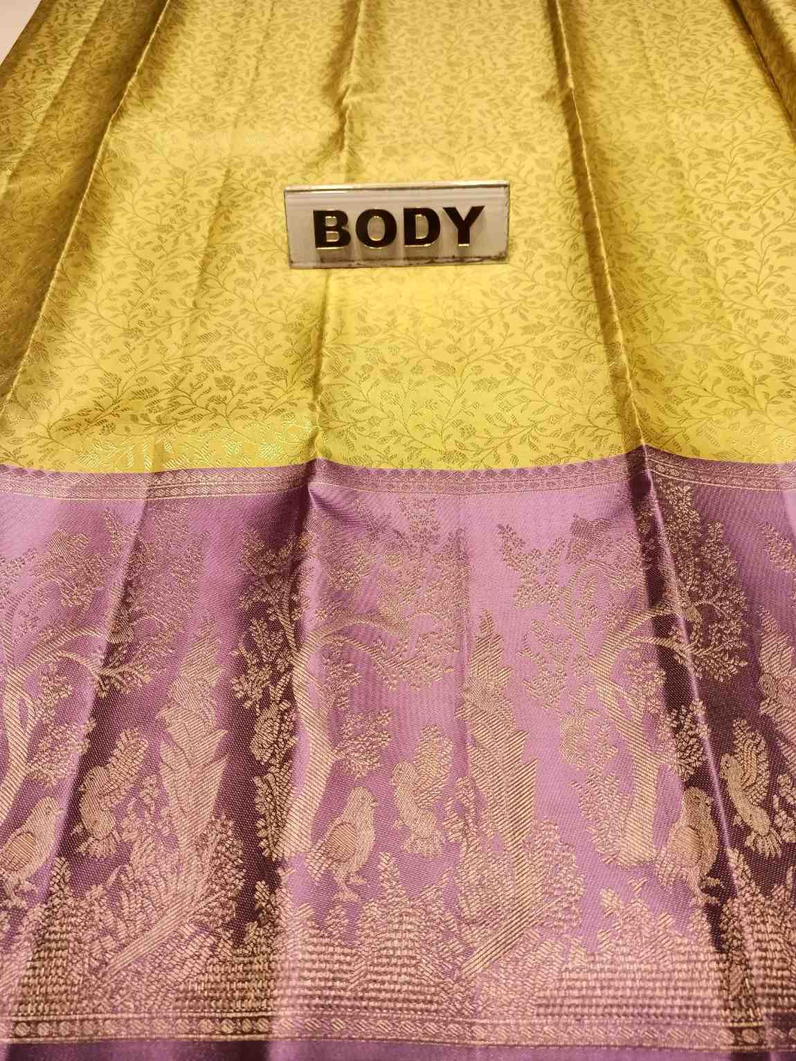 Yellow and purple fabric with a 'BODY' label