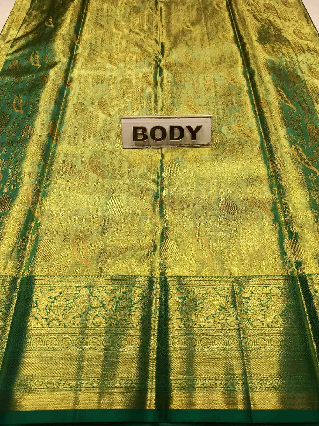 Green fabric with a 'BODY' label in the center