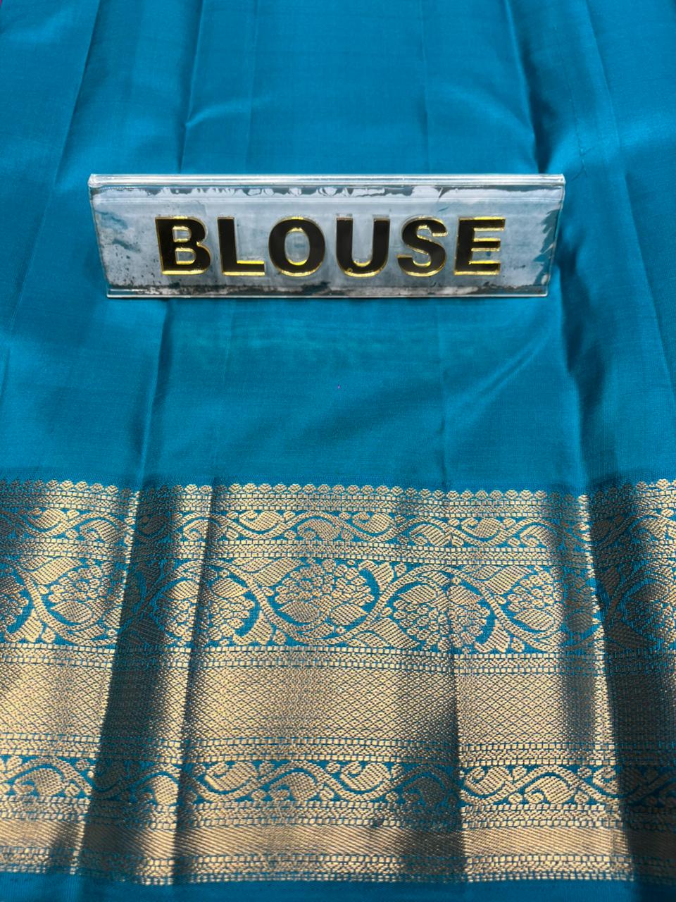 Pure Kanchipuram Silk Saree.