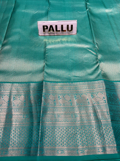 Pure Kanchipuram Silk Saree.