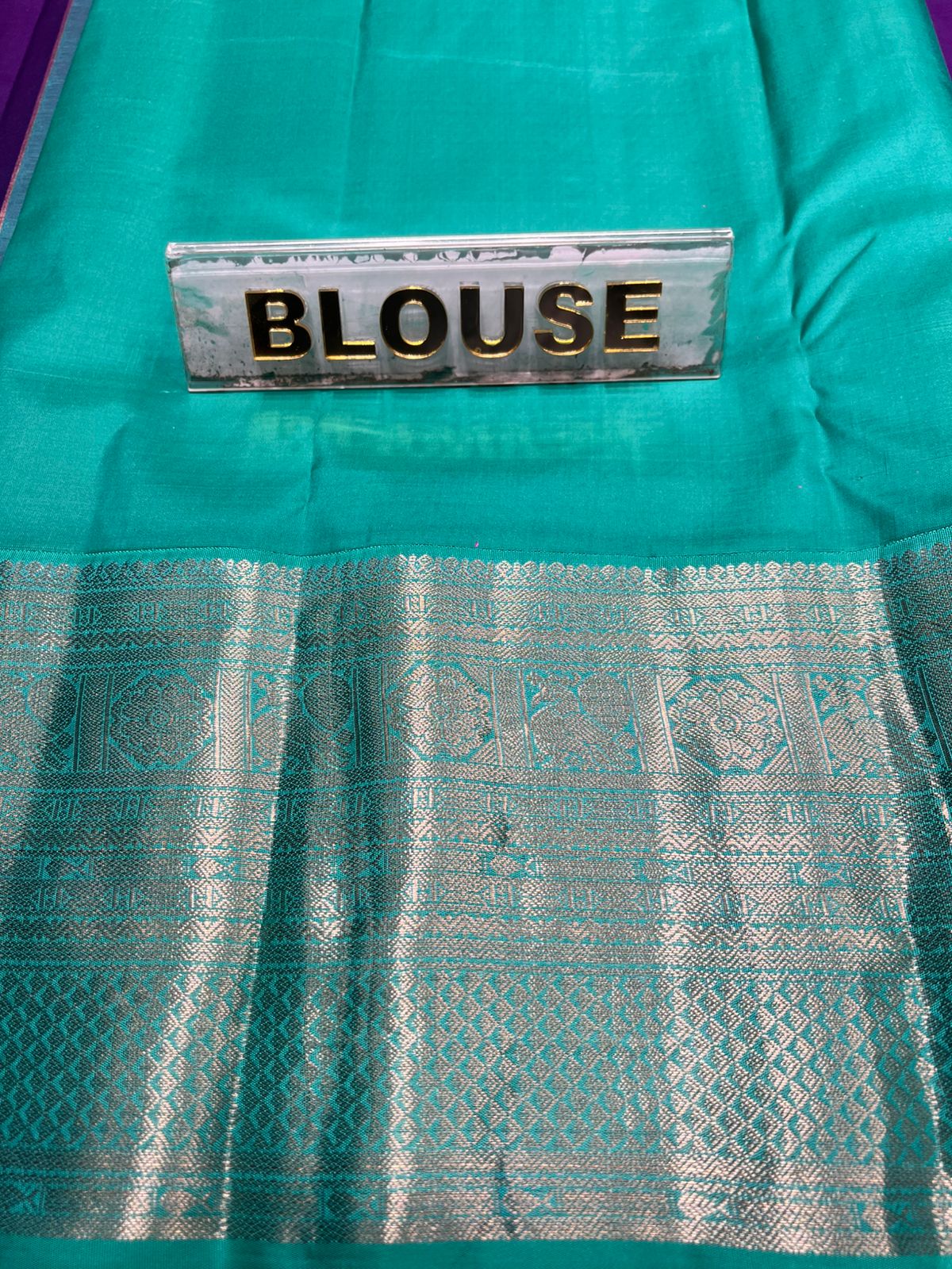 Pure Kanchipuram Silk Saree.