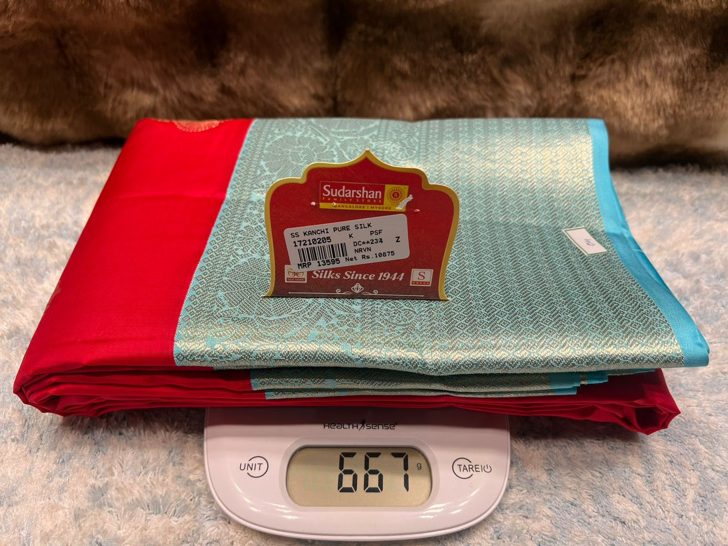 Pure Kanchipuram Silk Saree.