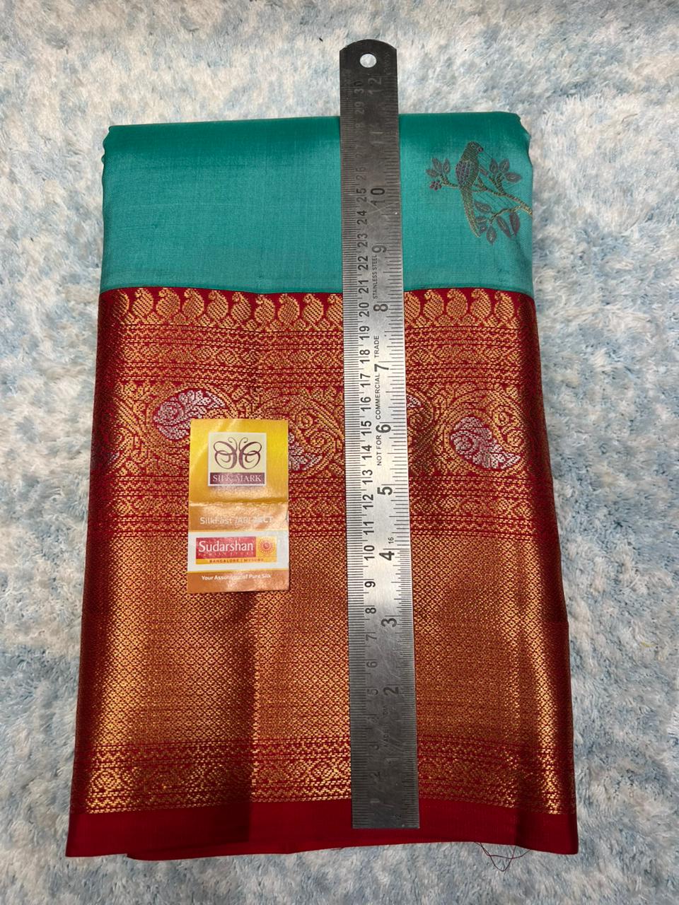 Pure Kanchipuram Silk Saree.