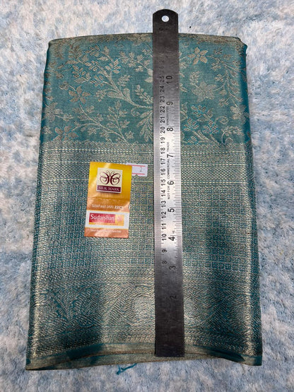 Pure Kanchipuram Silk Saree.