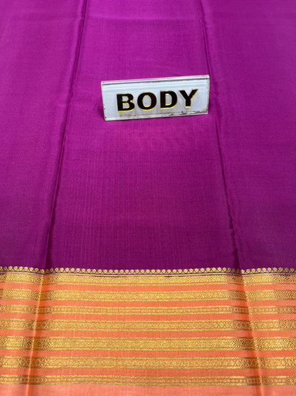 Purple fabric with a gold and orange border and a label reading 'BODY'.