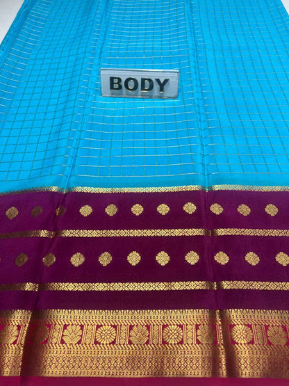 Blue and purple saree with gold patterns and a 'BODY' label.