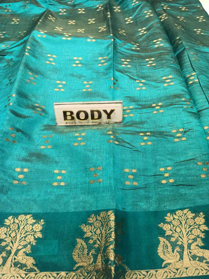 Teal fabric with gold patterns and a 'BODY' label.