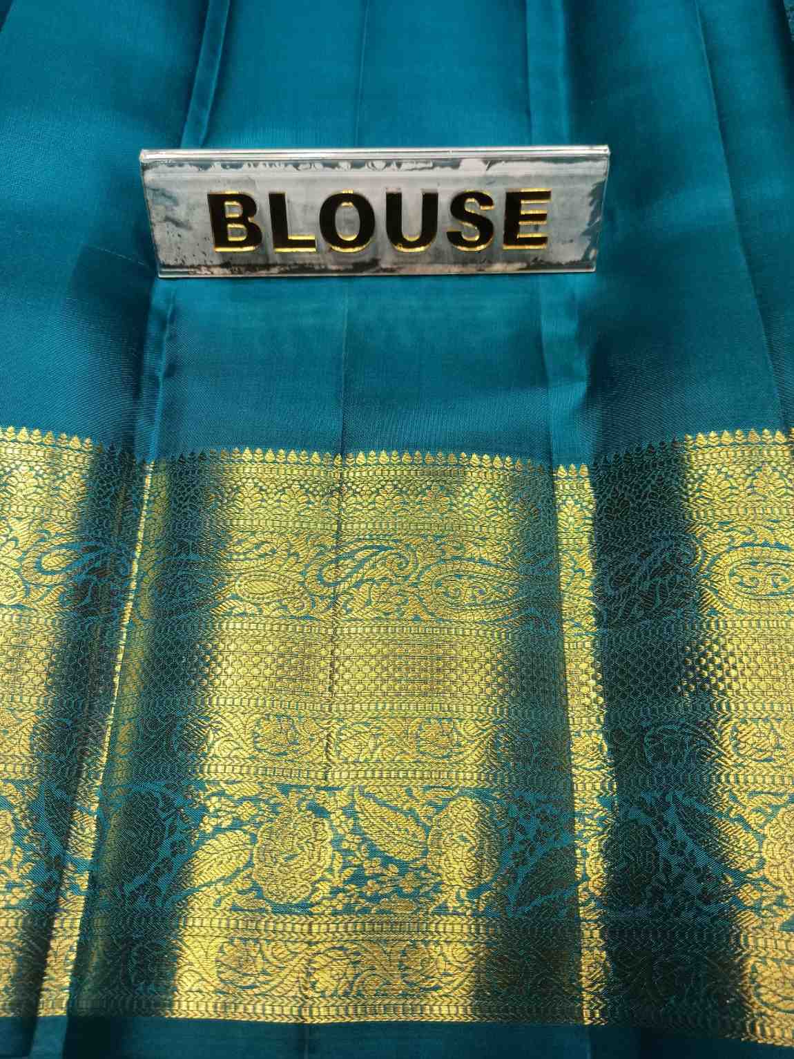Pure Kanchipuram Silk Saree.
