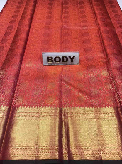 Red and gold saree with a 'BODY' label on a white background