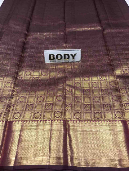 Brown and gold patterned fabric with a 'BODY' label.